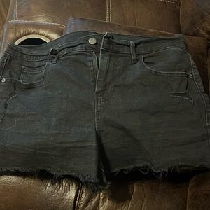 Black denim cutoff shorts.